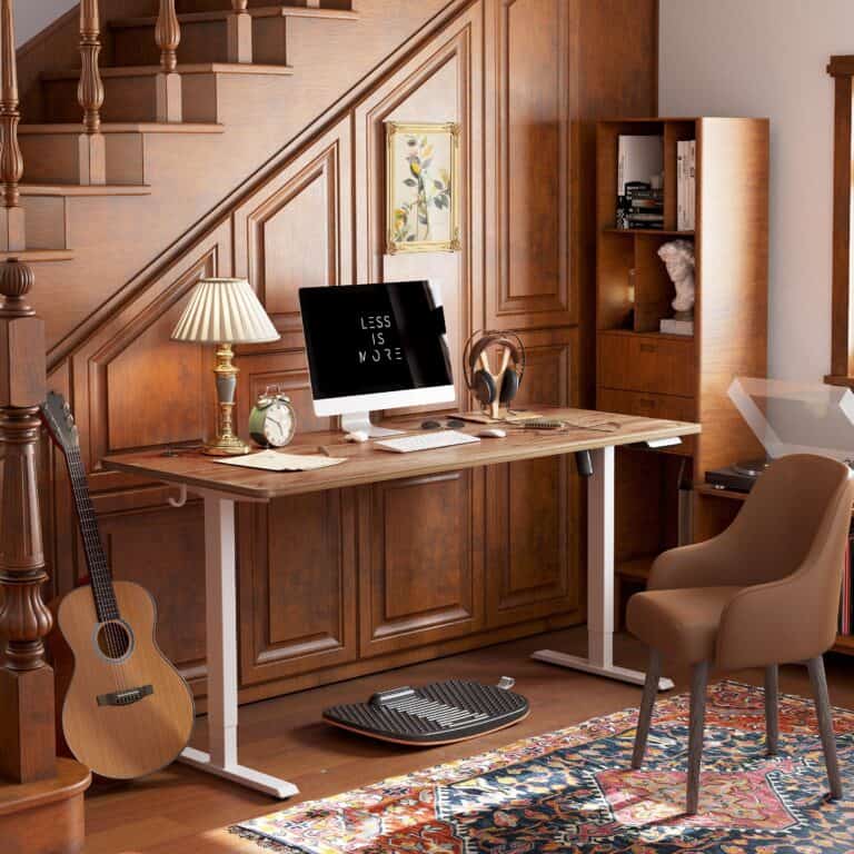 a compact desk with a computer and a guitar in a room